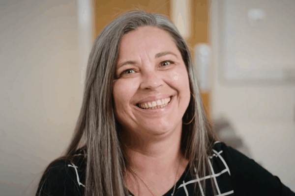 Carole Williamson smiling to camera