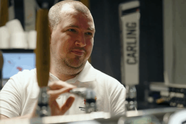 Aaron working behind the bar at Spennymoor Town FC
